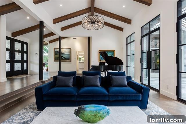 Spacious Living Room with Vaulted Ceilings and Exposed Beams in 5022 Pebblebrook