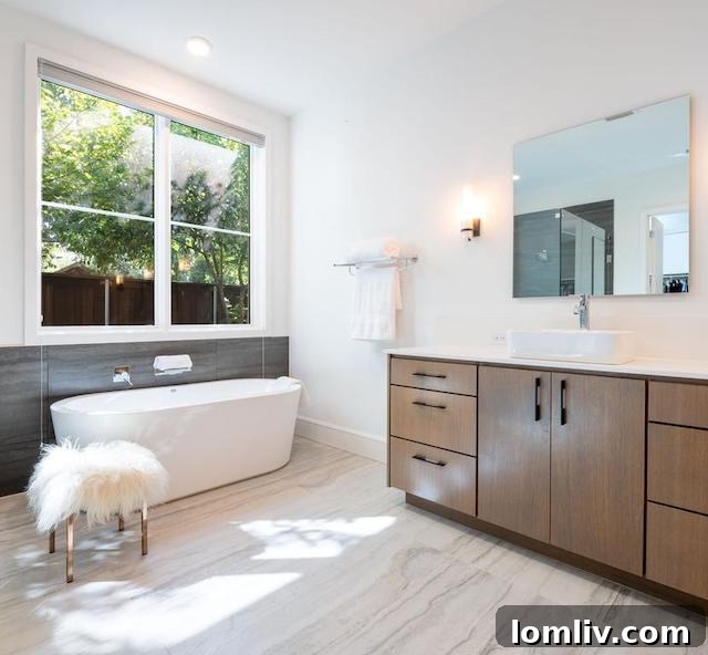 Elegant dining area adjacent to the modern kitchen in a Dallas luxury home