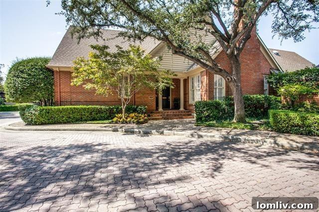 Charming traditional home exterior with manicured landscaping on Redwood Court