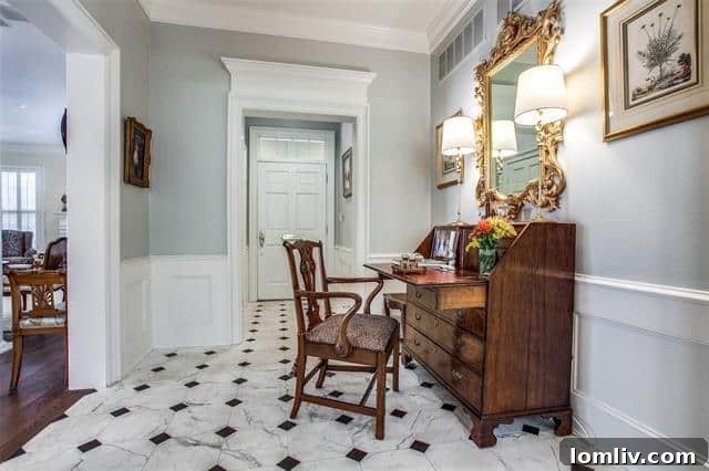 Elegant formal dining room with classic crown molding in a Devonshire home