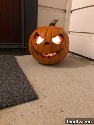 An artistic pumpkin featuring abstract carvings and a unique design