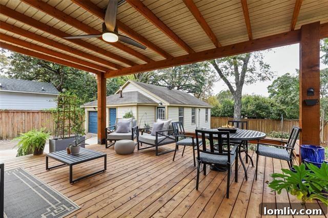 Bright and serene master bedroom with abundant natural light and a view of the garden