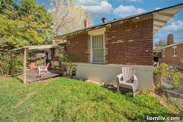 Rear exterior of 3142 College Avenue, showing laundry room access