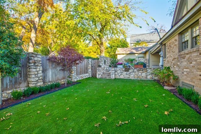 Berkley Place's Perfect Tudor: A Forest Park Masterpiece 17 Rear View of the Historic Tudor Home Showcasing Architectural Details