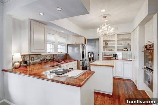 Berkley Place's Perfect Tudor: A Forest Park Masterpiece 8 Cozy Breakfast Nook with Sizable Built-in Buffet