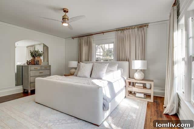 Berkley Place's Perfect Tudor: A Forest Park Masterpiece 9 Luxurious Ground Floor Master Bathroom with Dual Sinks and Large Shower