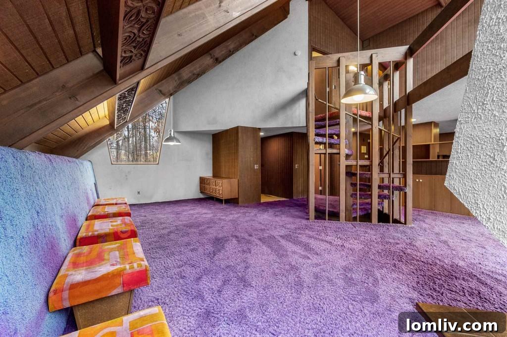 Another view of the purple carpeted interior, highlighting retro furniture