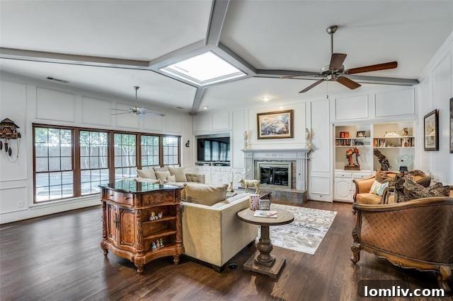The elegant dining area, seamlessly connected to the living space, featuring modern lighting and beautiful hardwood floors.