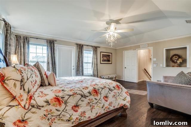 A comfortable and inviting bedroom, designed with ample space and natural light, perfect for relaxation.