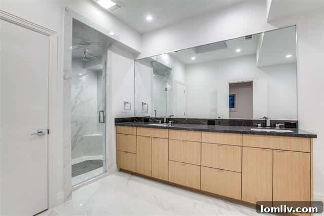 A generously sized bedroom, tastefully decorated with modern furnishings and abundant natural light, providing a comfortable sanctuary.