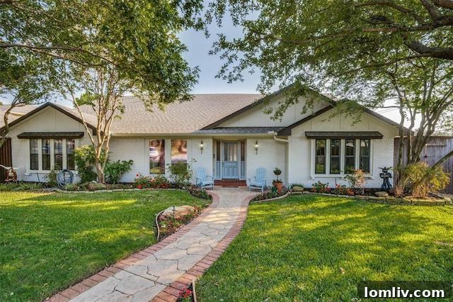 The charming curb appeal of the 'Steal' home in Lake Highlands, featuring a well-maintained exterior and inviting front entrance.