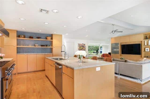Gourmet kitchen with large island and Heath Ceramics tile