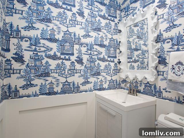 Stylish, updated bathroom with unique wall coverings and modern fixtures