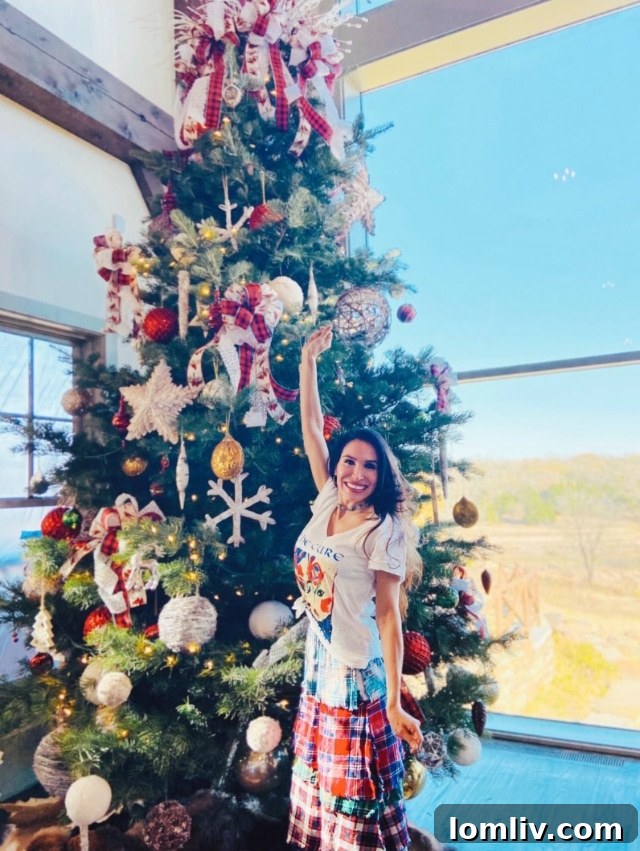 Another grand Christmas tree adorned with festive decorations