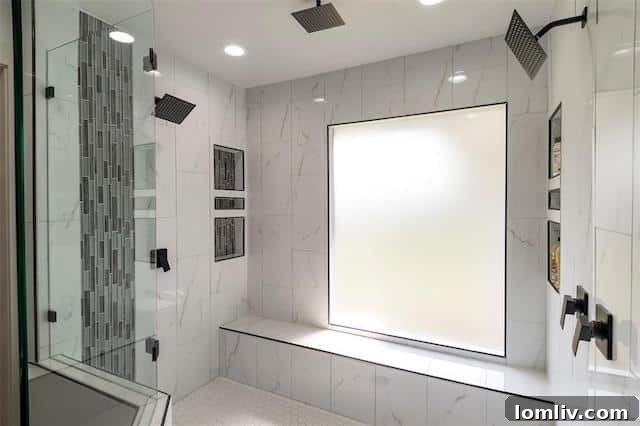 Exterior view of a remodeled Dallas home with a 3-car detached garage and lush landscaping.