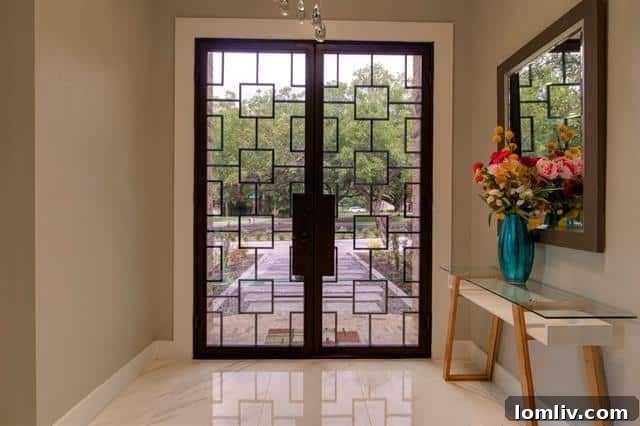 Bespoke staircase and open-concept living in a Casa Linda Estates property