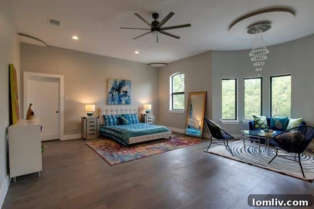 Spacious living area with natural light and elegant furnishings