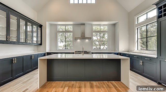 Modern New Leaf kitchen with black cabinetry and island, designed by Samantha Bailey