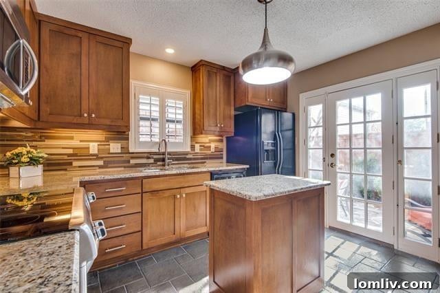 A modern kitchen in a Valley Ranch home featuring custom cabinetry and high-end appliances, a key selling point for discerning buyers.