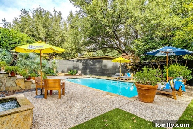 Midcentury Brilliance: A Home That Colors Your World with Joy 10 Bright and inviting living space showcasing the architectural details and flow of the mid-century home