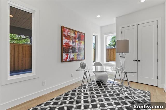 The Hopkins Avenue duplex features a dedicated study and luxurious master suite, providing comfort and functionality for modern Dallas living.