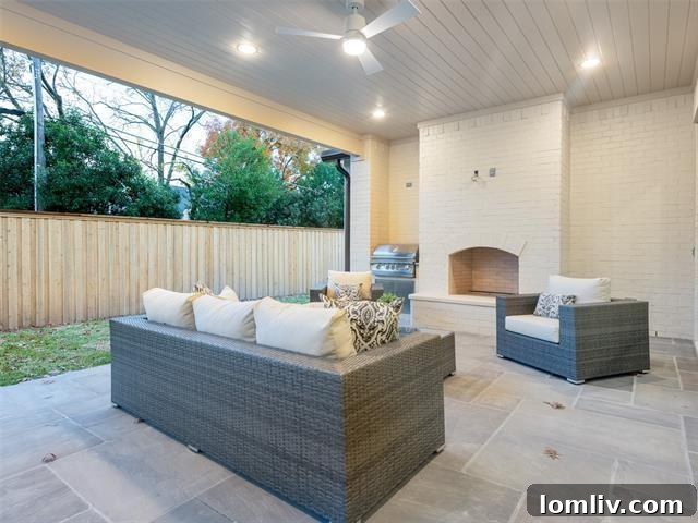 Covered outdoor patio with fireplace