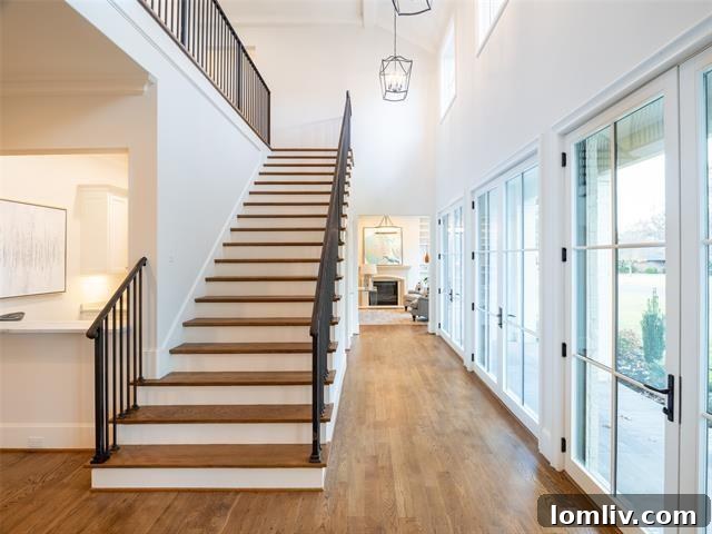 Grand living space with high ceilings and custom finishes