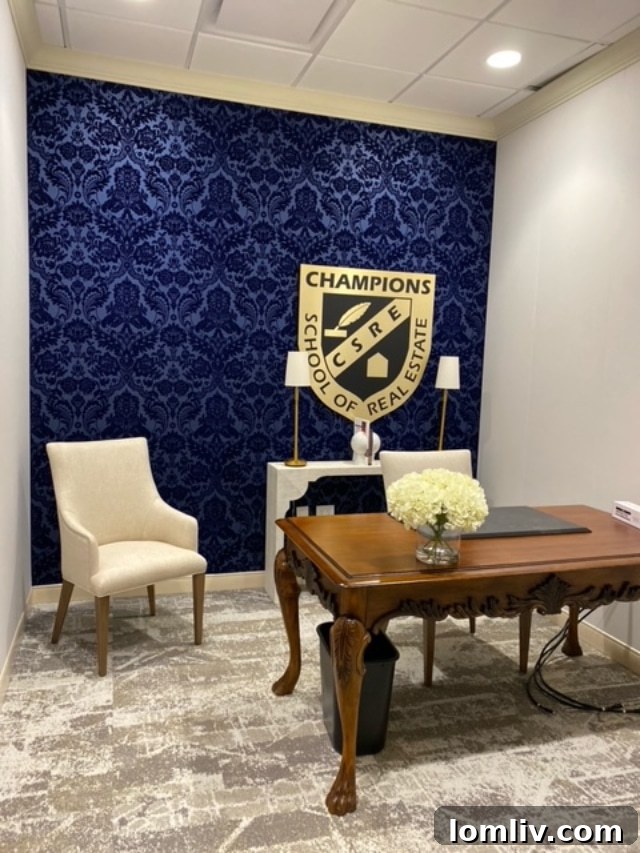 A student focusing on a lesson in a classroom at Champions School of Real Estate