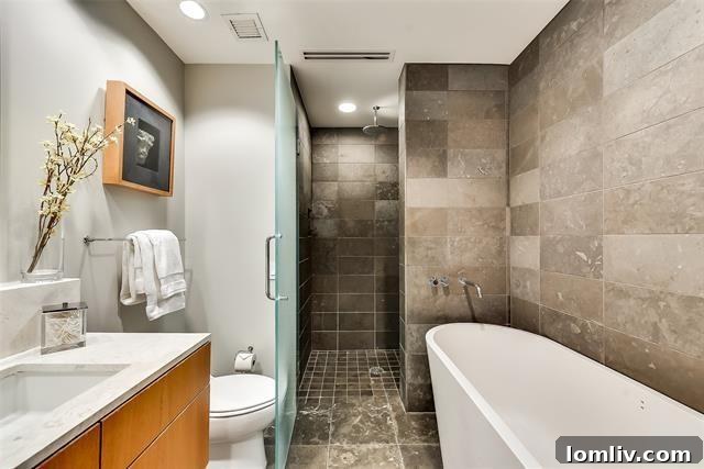 Sleek modern bathroom design with contemporary fixtures in W Residences Dallas