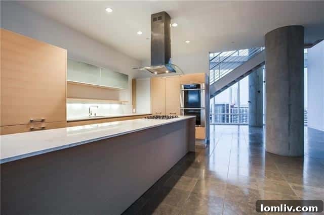 Luxurious master bathroom with soaking tub and double vanity in W Residences Dallas #2709