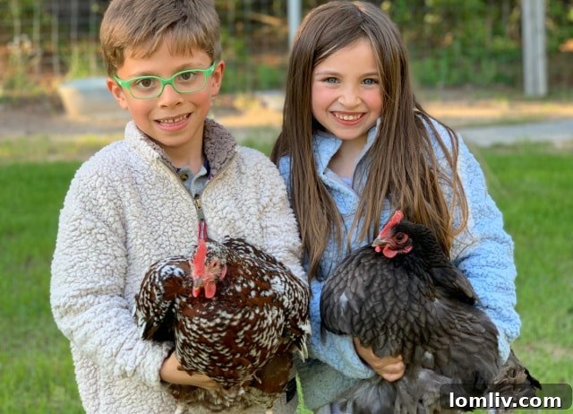 Children happily engaging with their chickens on a sprawling East Texas ranch, embodying a connection to nature and sustainable living.