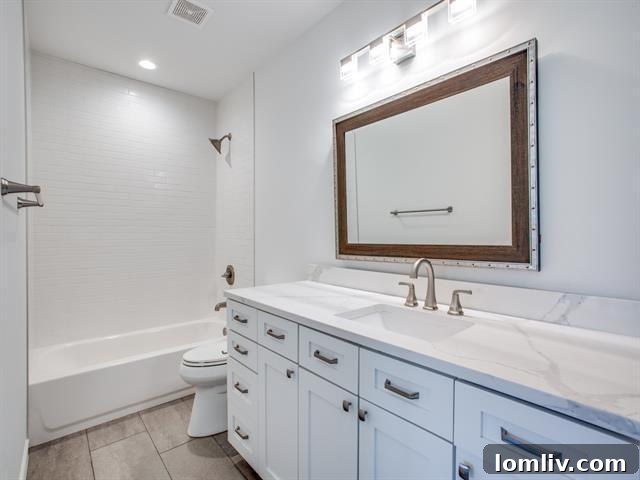 Cozy bedroom with vaulted ceiling and wood beam accent
