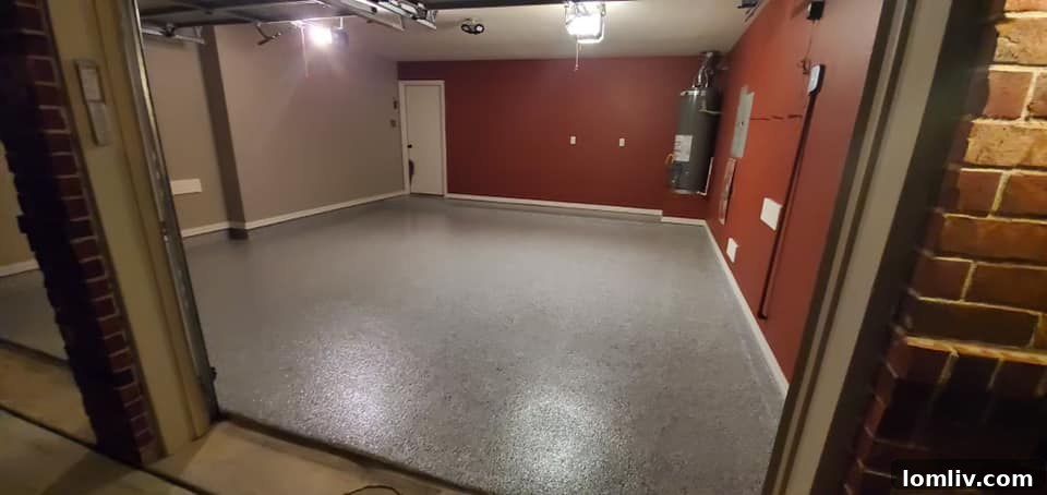 After image of a freshly installed, smooth epoxy garage floor with decorative flakes, showcasing a dramatic upgrade.