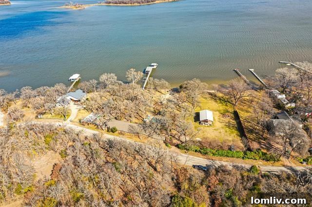 Panoramic view of the multi-unit property at 9432 Heron Drive, highlighting its expansive footprint.