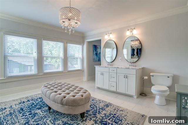 Spacious master bathroom with oversized spa tub in tranquil setting
