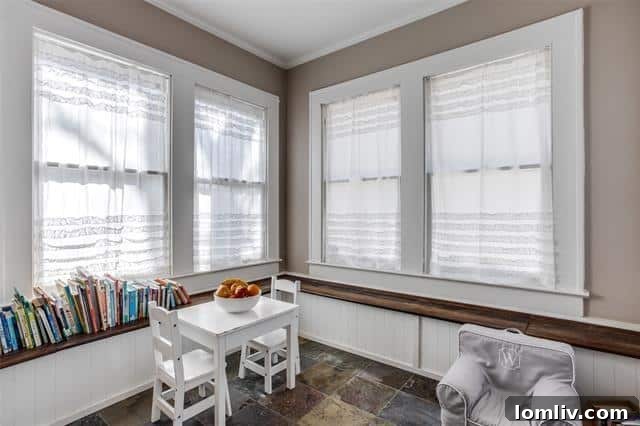 Sunroom with ample natural light, ideal for breakfast nook or play area