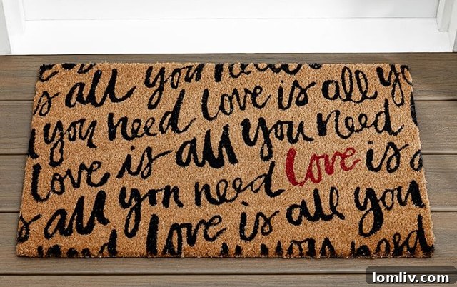 Pottery Barn Heart Doormat with 'Love is All You Need'