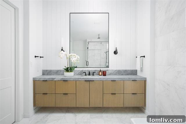 Contemporary powder room design with unique vanity