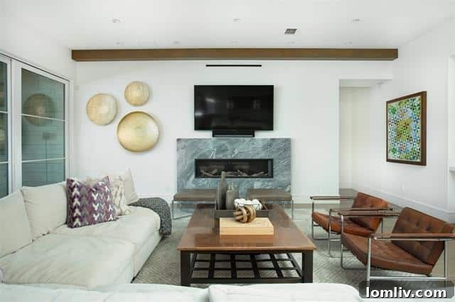 Spacious living area with high ceilings and abundant natural light