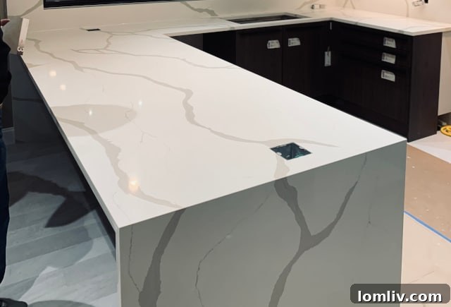 StoneCraft: Your Renovation Game Changer 4 Luxury Kitchen Island with Waterfall Edge