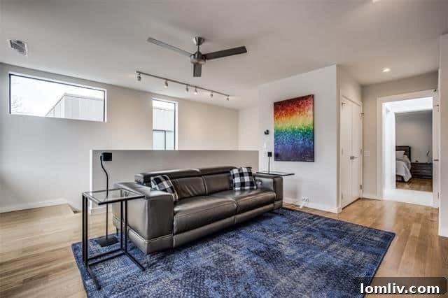 upper level lounge area with wet bar and wine cooler