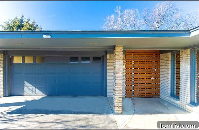 Charming exterior of the Midcentury Modern home on a large half-acre lot in North Oak Cliff