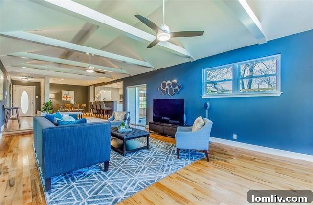 Stylish, upgraded kitchen with granite countertops and an open layout in the North Oak Cliff home