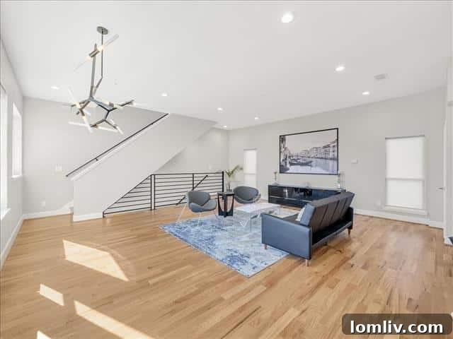 Another perspective of the contemporary kitchen, highlighting the spacious layout and connection to living areas.