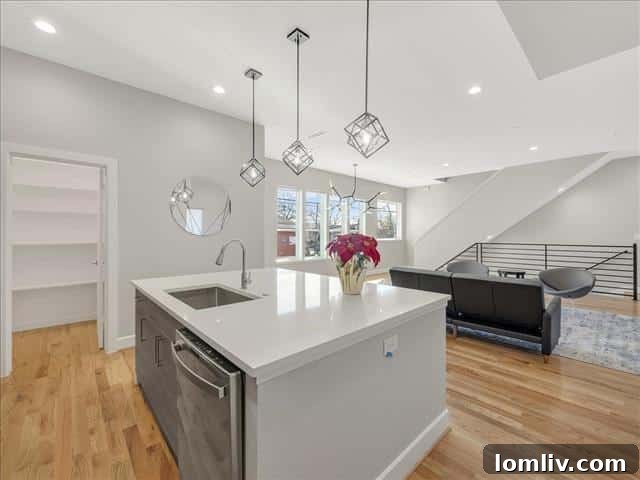 Elegant dining area adjacent to the kitchen, perfect for entertaining with abundant natural light.
