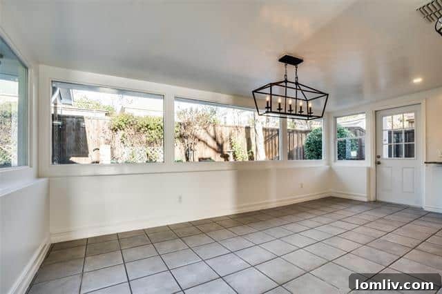 Cozy bedroom with ample natural light, part of the appeal of this Lake Highlands property.