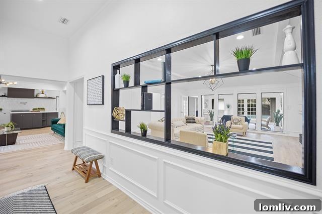 Luxurious master bathroom with a freestanding tub and stylish barn doors, offering a spa-like retreat.