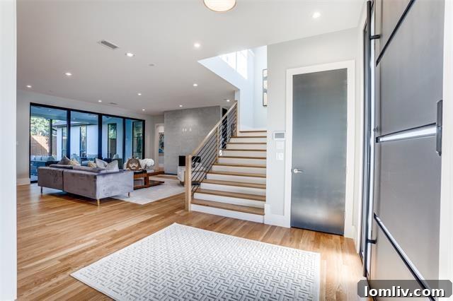 Gourmet kitchen with custom blue cabinetry and built-in appliances, a highlight of a Walnut Hill luxury open house.