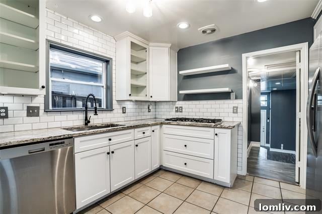 Bright and airy living room, perfect for family life in this updated Lake Highlands home.