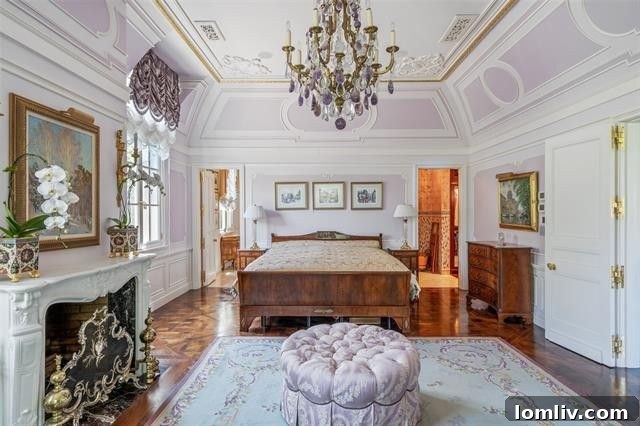 Spacious kitchen with modern appliances, classic cabinetry, an island, and elegant lighting